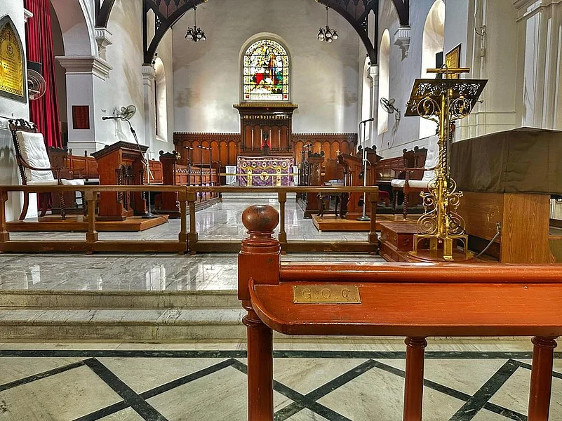 The churchs interior features exquisite stained glass windows and intricate woodwork